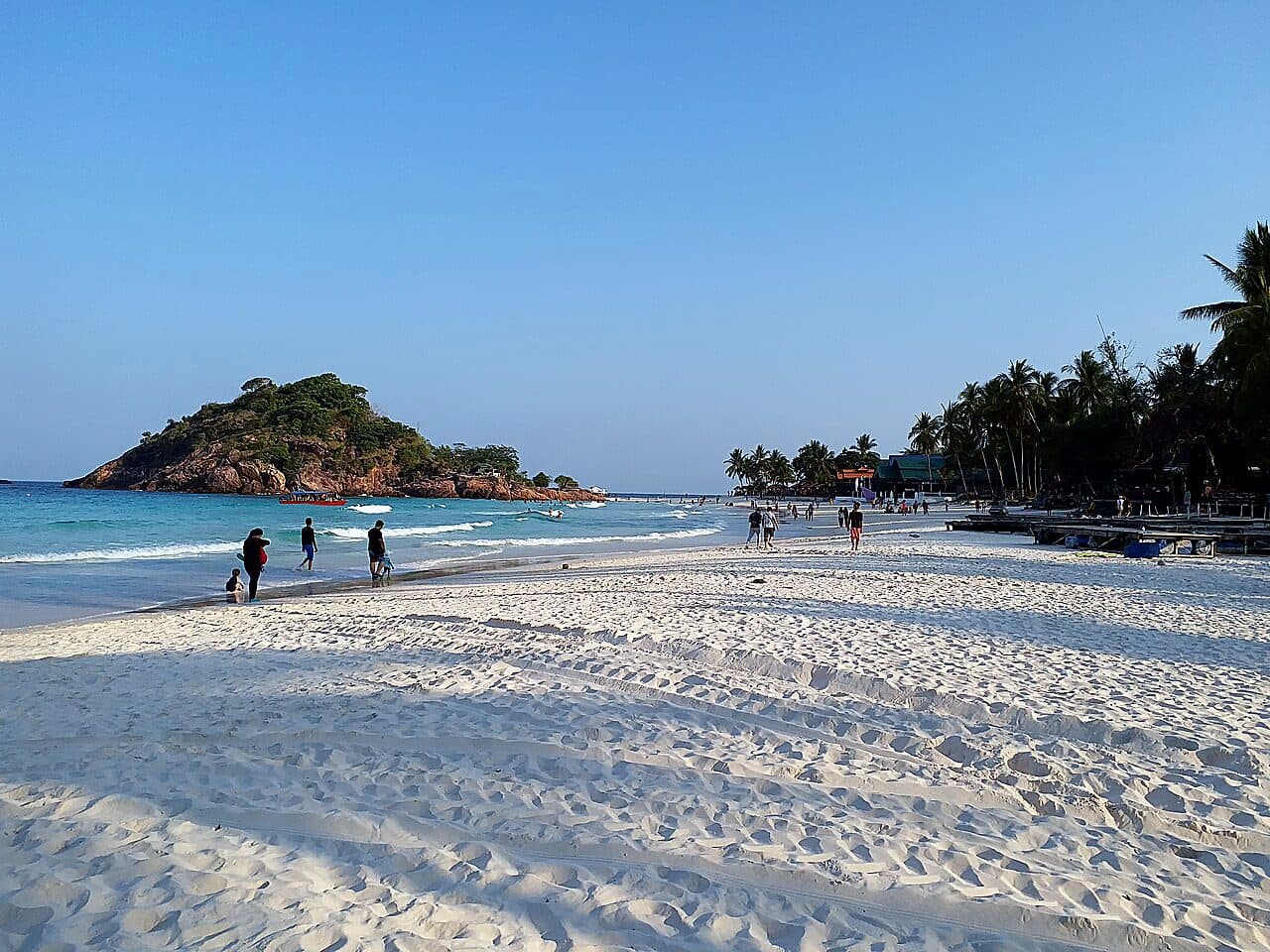 Calm, clear turquoise water and white sand on Pulau Redang during the open season
